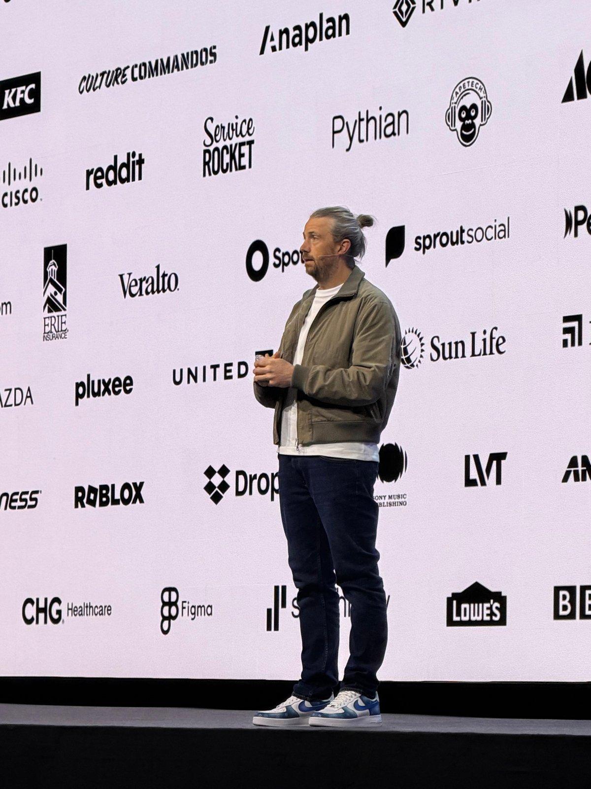 Mike Cannon-Brookes on stage in front of Atlassian customers